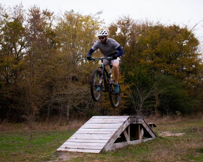 Biker riding on the biking trail at the Outdoor Adventure.